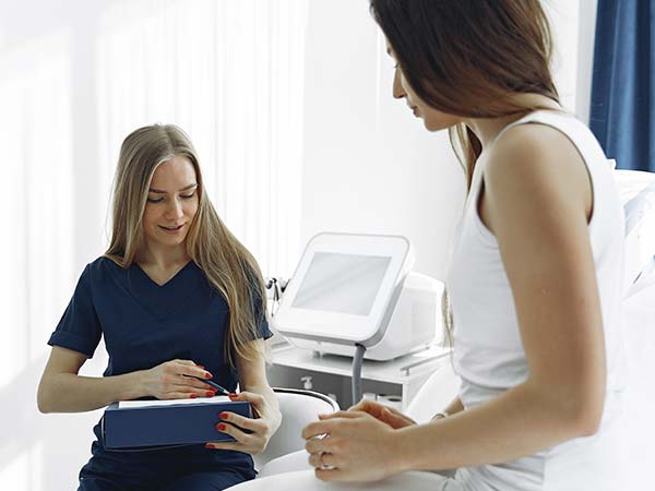 A healthcare professional discusses medical results with a patient.