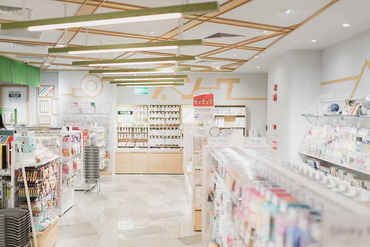 Bright, modern beauty store interior with shelves of skincare and cosmetic products.