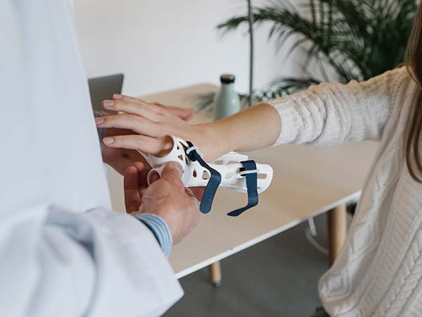 A healthcare professional measuring a patient's blood pressure.