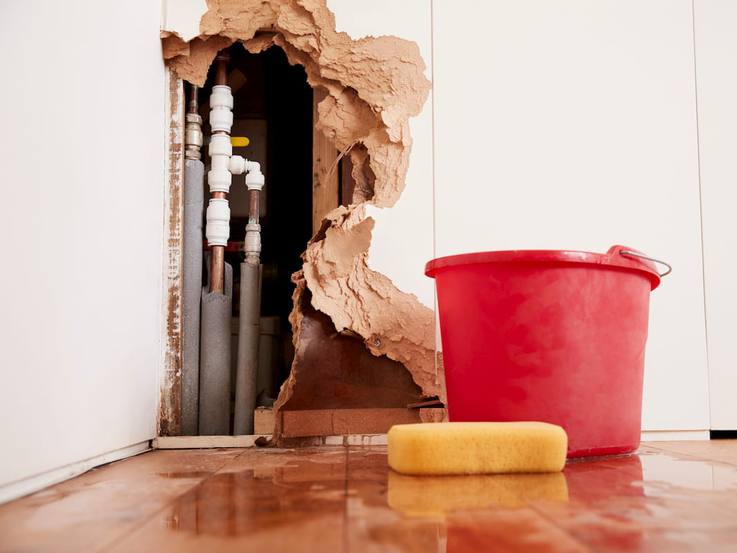 A wall with a hole in it 
