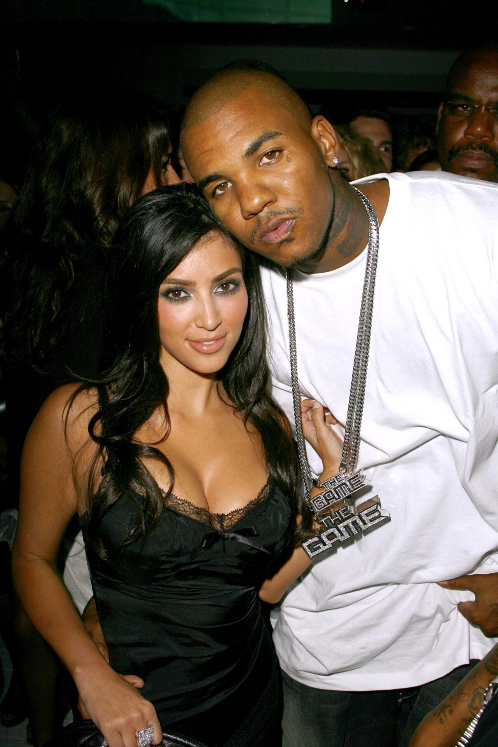 Man and woman posing at an event.
