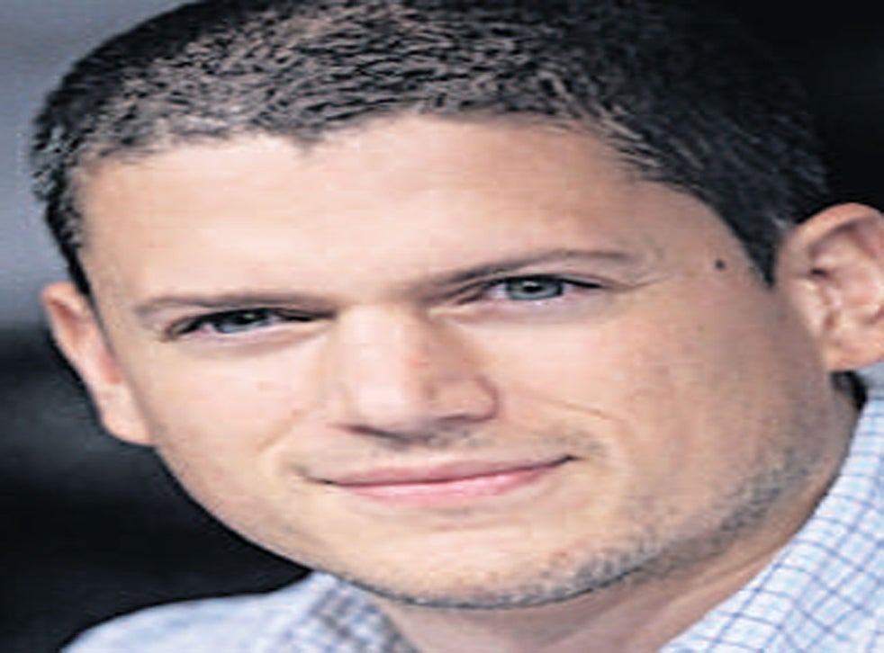 Man with short hair and light shirt.
