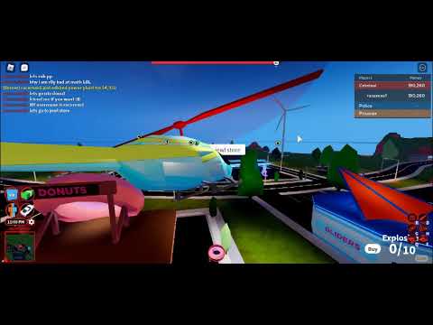 Video game scene with helicopter and buildings.